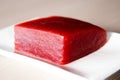 Fresh toro tuna on a black background.